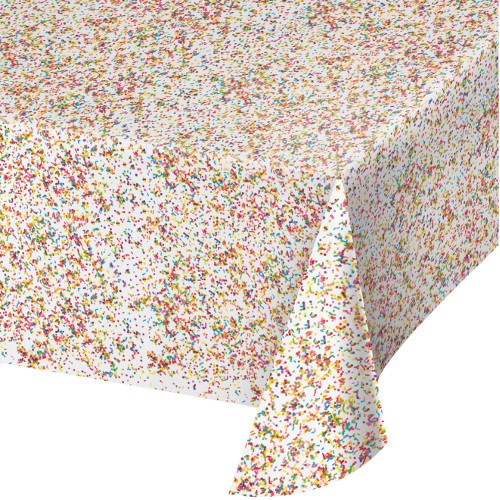 White rectangular plastic tablecover with multicolored confetti sprinkles pattern.
