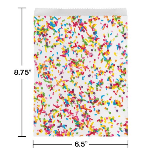 White paper treat bag with colorful confetti sprinkles pattern, rectangular shape, 8.75 by 6.5 inches.