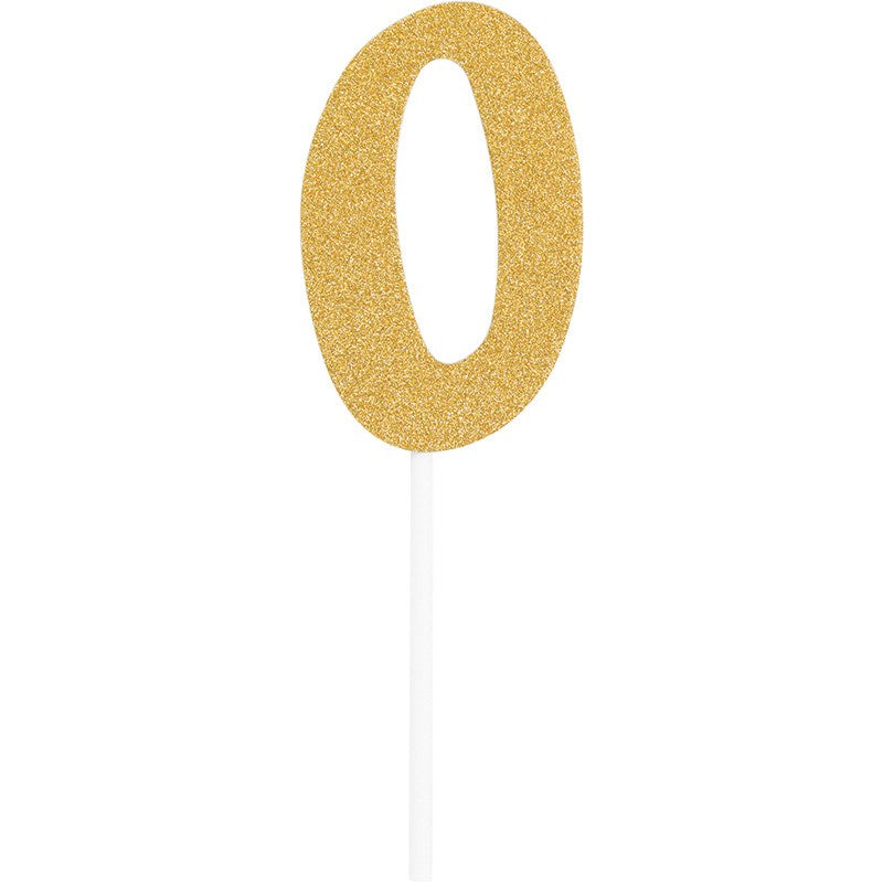 Gold glitter number 0 cake topper with white stick pick.