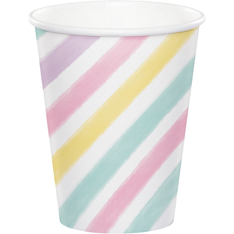 Paper cup with diagonal pastel stripes in pink, yellow, purple, and teal on white background.