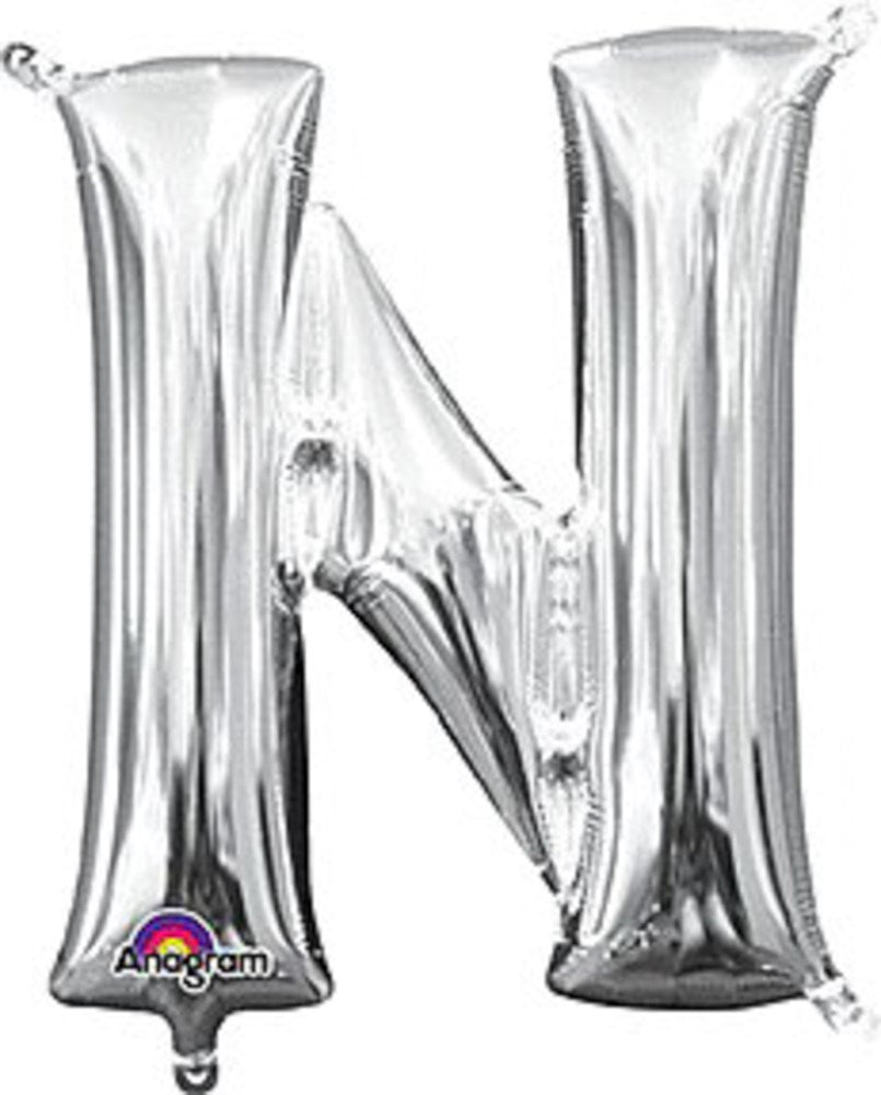 Silver foil balloon shaped like the letter N, shiny and metallic with a smooth surface.