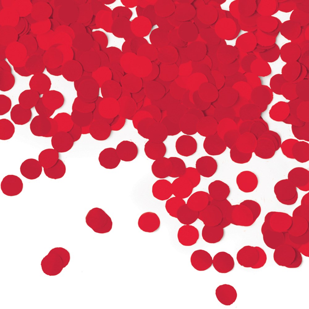 Bright red round tissue paper confetti scattered on a white surface.