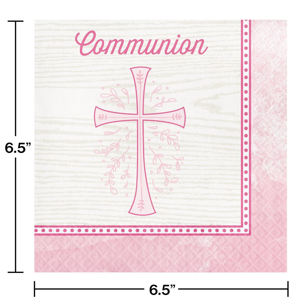 Square pink and white lunch napkin with decorative cross and "Communion" text, 16 pieces.