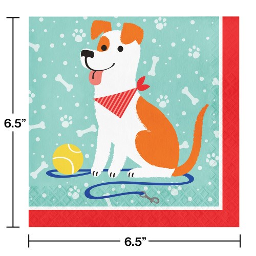 Square blue and red paper napkin featuring a happy white and orange dog with a red bandana, tennis ball, and leash design.