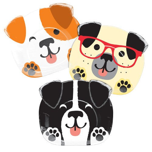 Set of three 9-inch dog-shaped paper plates with playful cartoon faces in orange, cream with red glasses, and black colors.