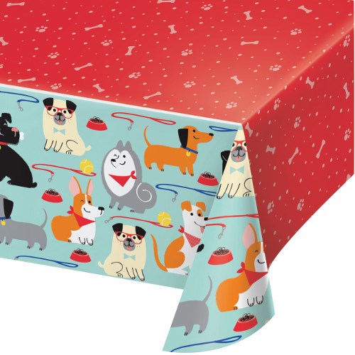 Red rectangular tablecover with scattered white paw prints and a blue border featuring cartoon dogs and bones.