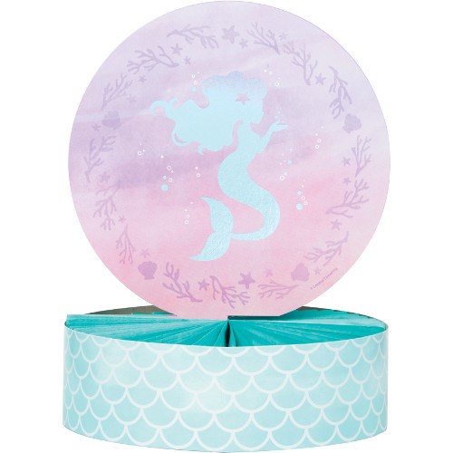 Round pastel purple and pink centerpiece featuring a mermaid silhouette, mounted on a teal scalloped base resembling fish.