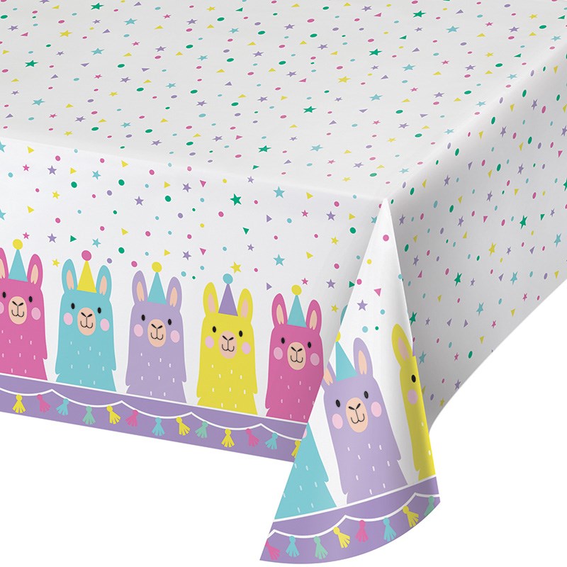 White rectangular tablecover with colorful llama faces and multicolored confetti dots, 54x102 inches.