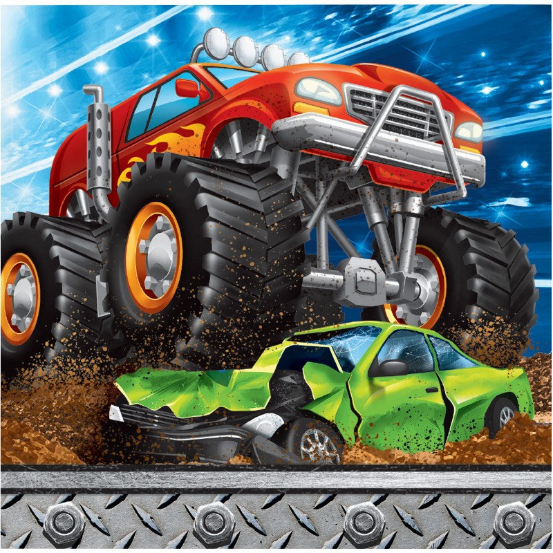 Red monster truck crushing a green car on dirt, with big black tires and bright headlights.