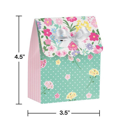 Small rectangular favor bag with pastel floral pattern, mint green base with polka dots, pink striped sides, and white satin