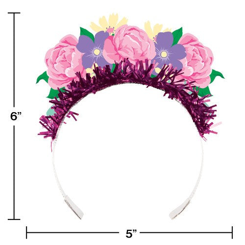 Pink and purple floral tiara headband with green leaves and shiny magenta fringe, 6 inches tall.