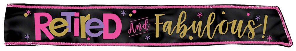 Black fabric sash with pink, green, and yellow lettering reading "Retired and Fabulous!" and pink border trim.