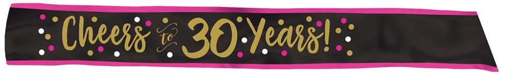 Black fabric sash with pink trim and gold text reading "Cheers 30 Years!" decorated with stars and confetti.