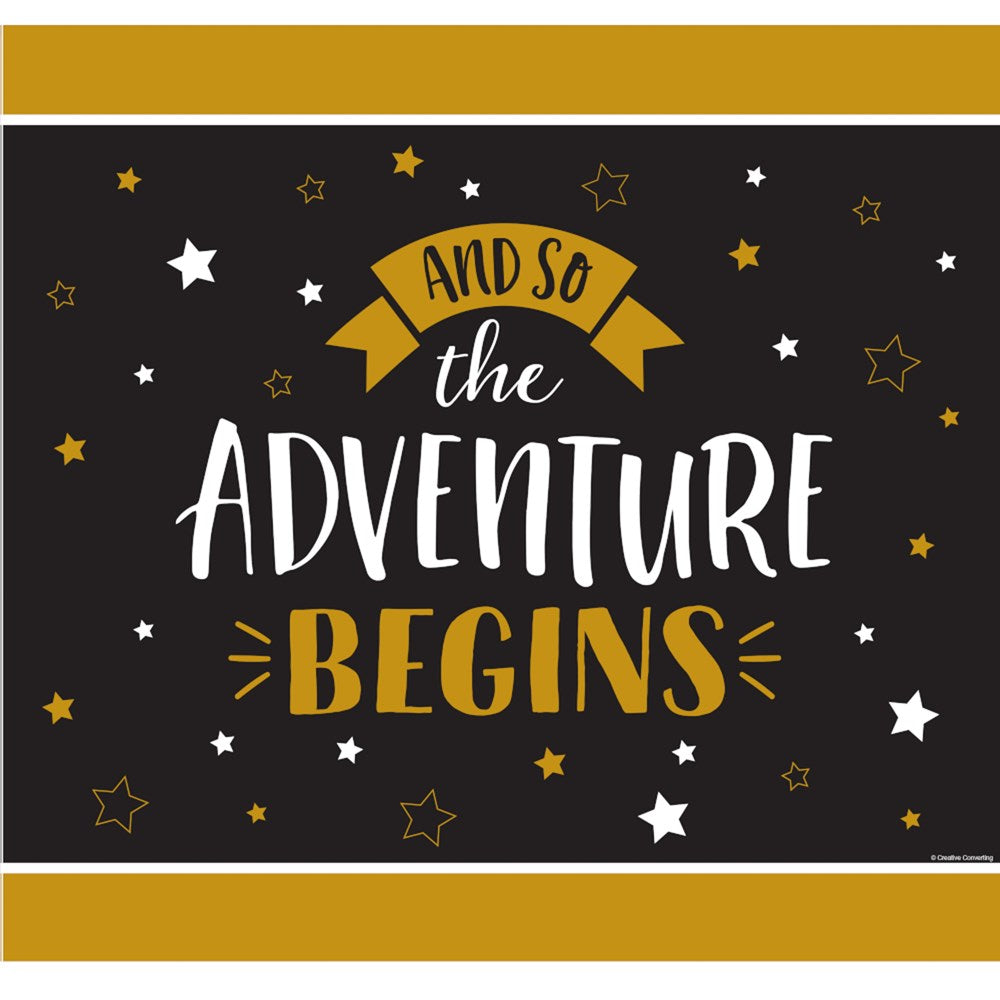 Black yard sign with gold and white text "And So the Adventure Begins" surrounded by gold and white stars.