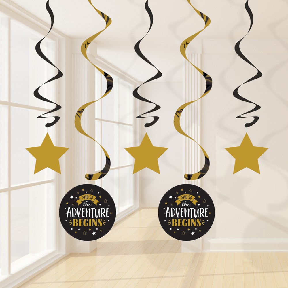 Set of five hanging spirals in black and gold with stars and round signs reading "The Adventure Begins" for graduation decor.