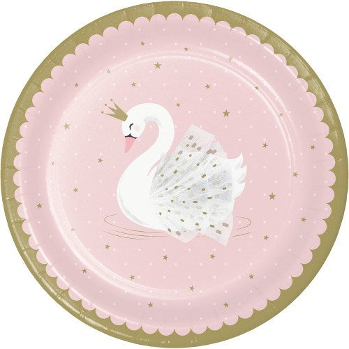 Pink 9-inch round paper plate with scalloped gold edge and a white swan wearing a gold crown surrounded by gold stars.