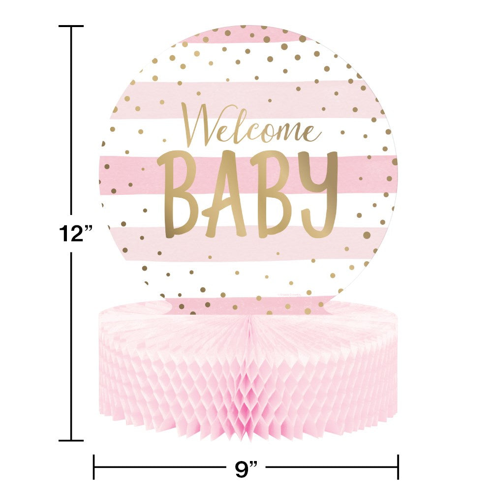 Pink and gold honeycomb centerpiece with "Welcome Baby" text on striped circular topper.
