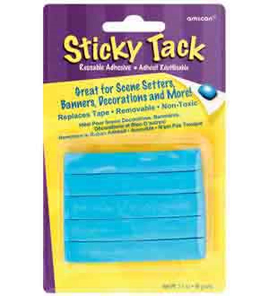 Blue rectangular strips of adhesive sticky tack in clear plastic packaging with purple and yellow label.