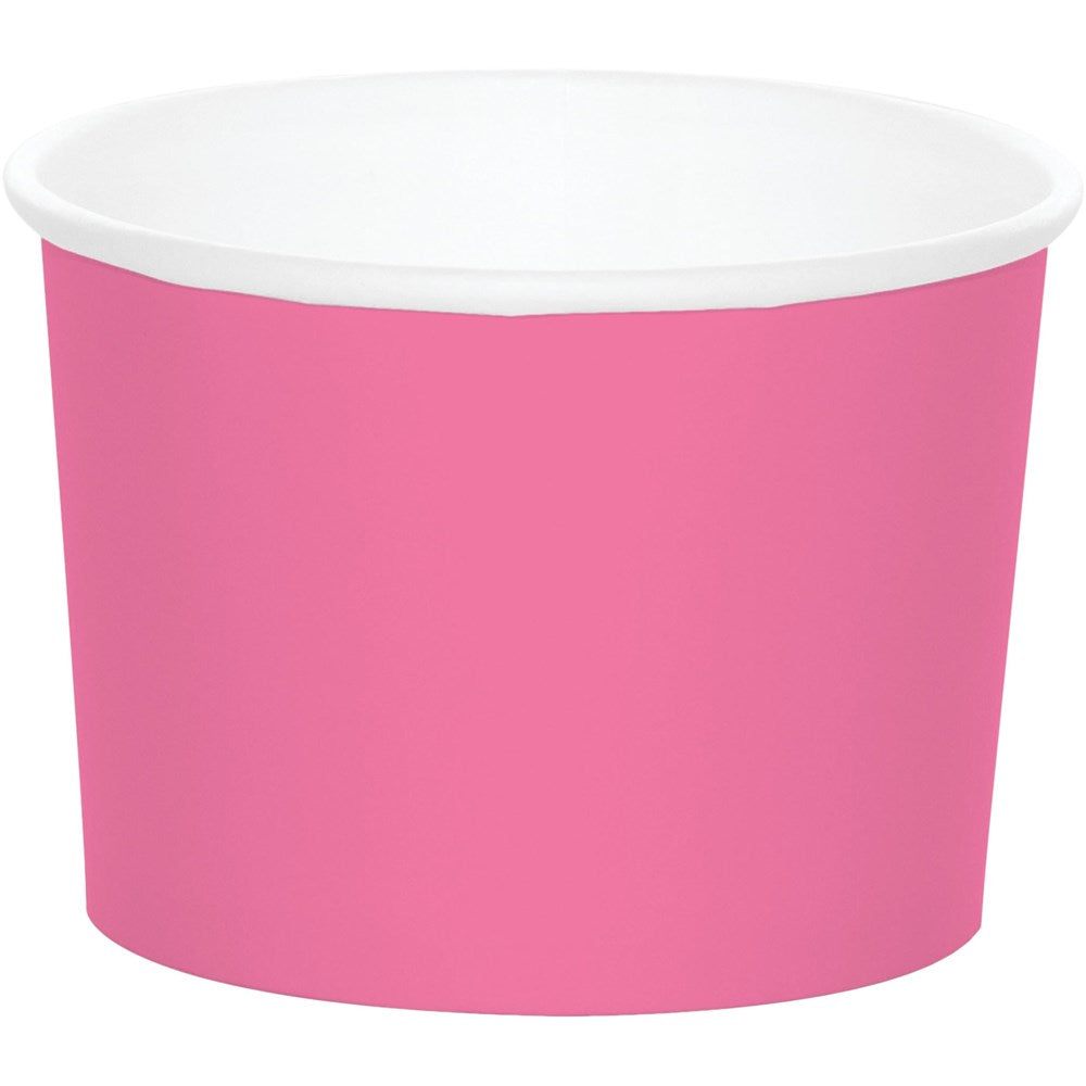 Set of eight candy pink paper treat cups with white interior, round shape.