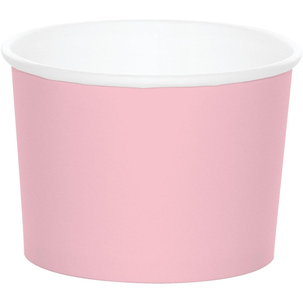Light pink paper treat cup with white interior and rolled rim, round shape, small size.