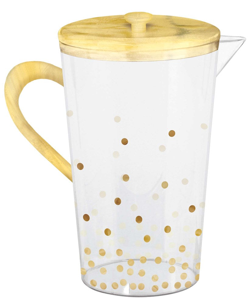 Clear glass pitcher with light wood lid and handle, decorated with gold polka dots.