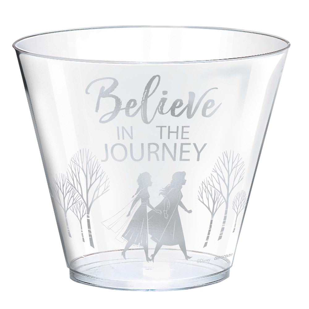 Clear plastic tumbler with silver "Believe in the Journey" text and silhouettes of two girls walking among bare trees.
