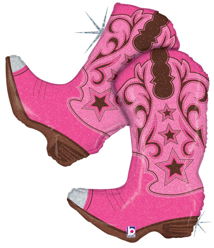 Pink holographic foil balloon shaped like a pair of cowboy boots with decorative swirls and stars.