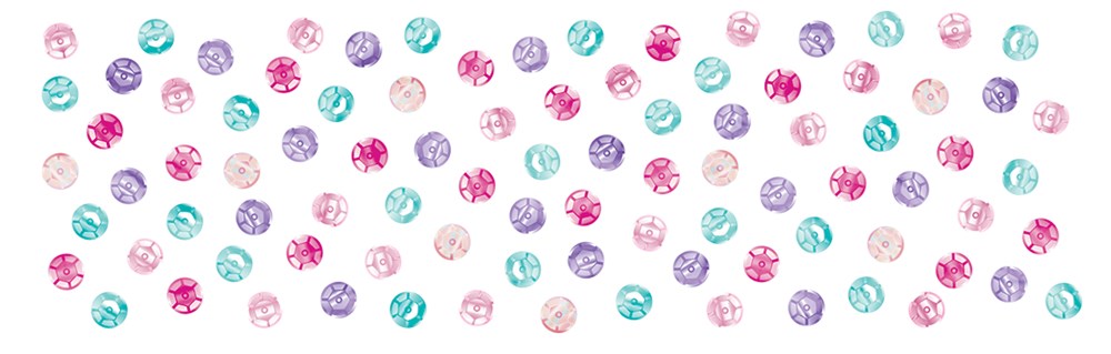 Colorful round confetti pieces in pink, purple, teal, and white with unicorn and star designs scattered on white background.