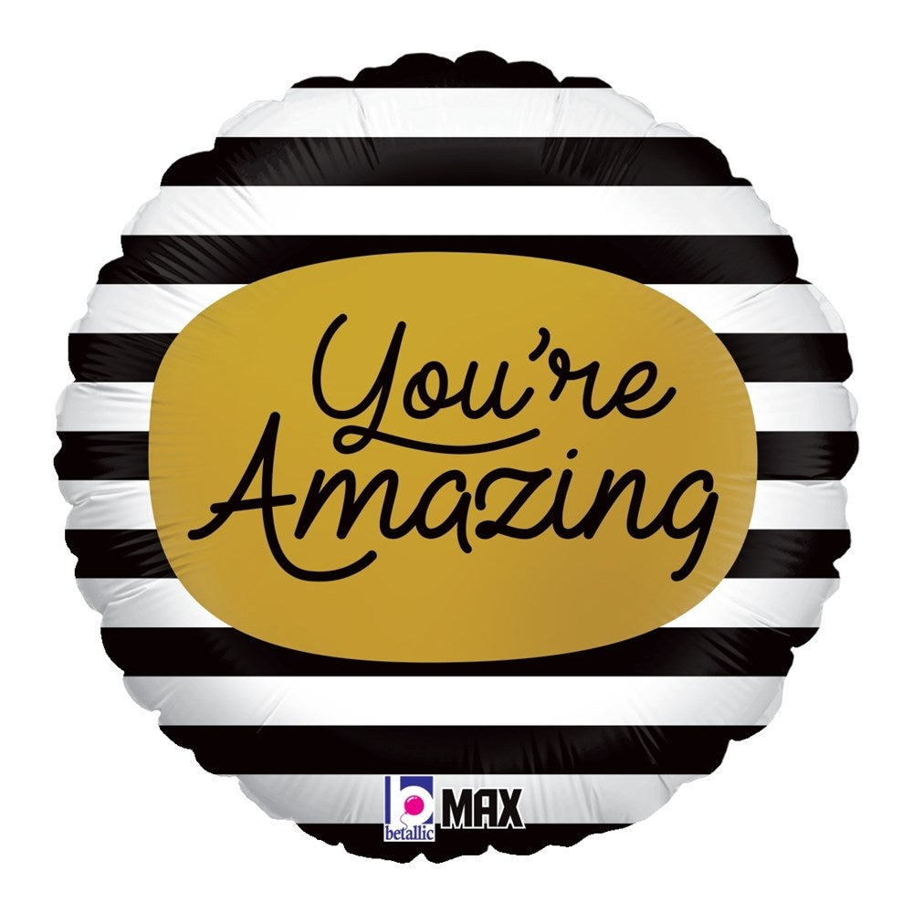 Round foil balloon with black and white horizontal stripes and a gold oval center reading "You're Amazing" in black cursive.