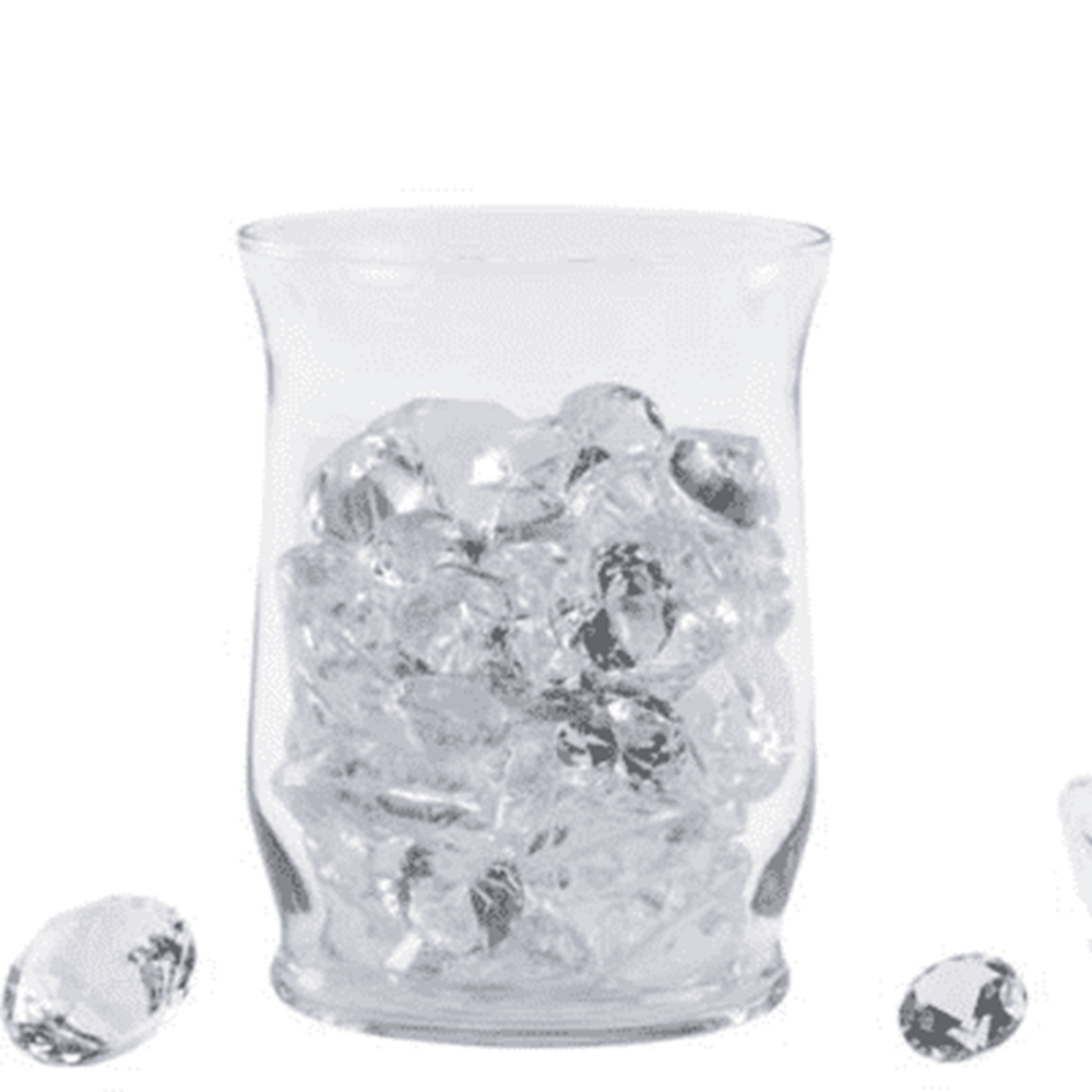 Clear plastic cup with a slightly tapered shape filled with irregular clear ice cubes and scattered ice cubes beside it.