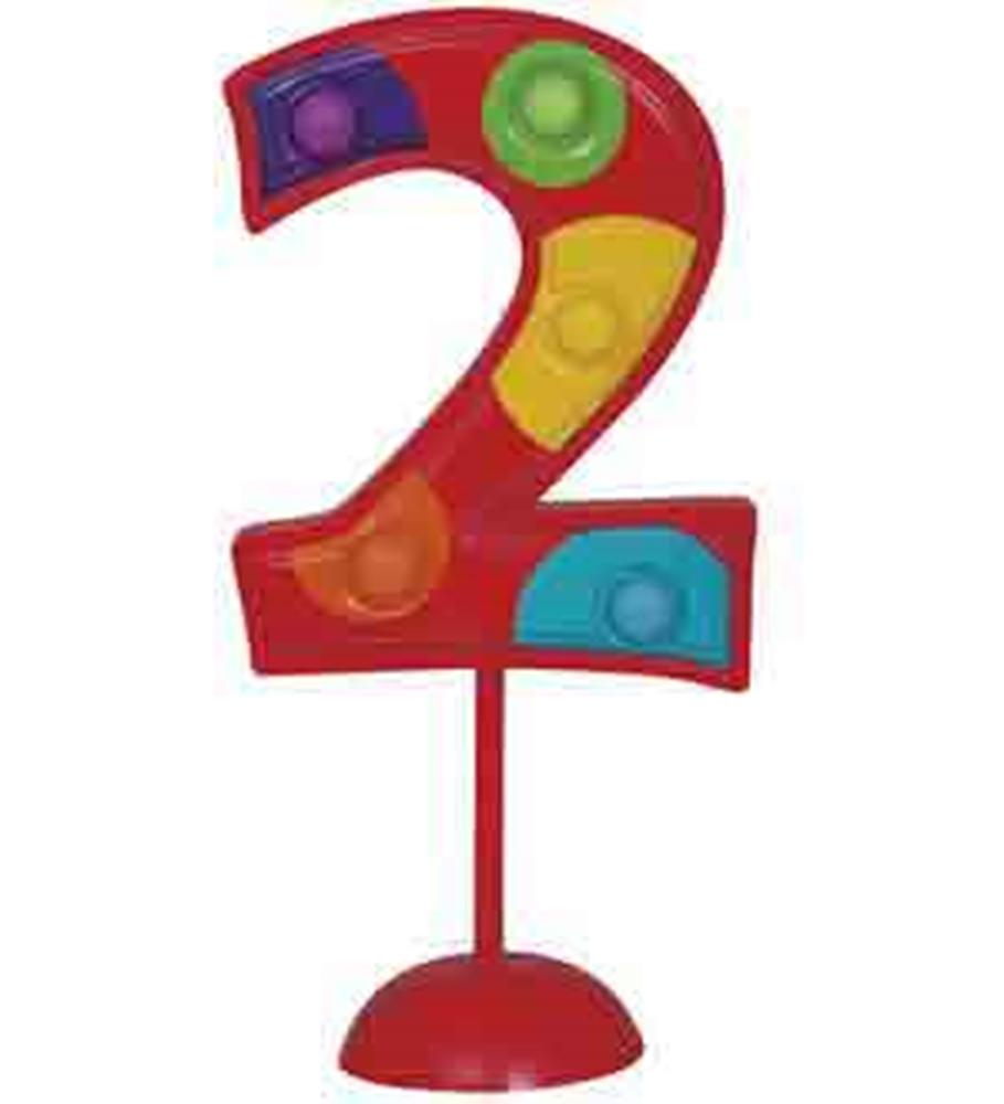 Red number 2 cake decoration with multicolored flashing lights and a red base stand.