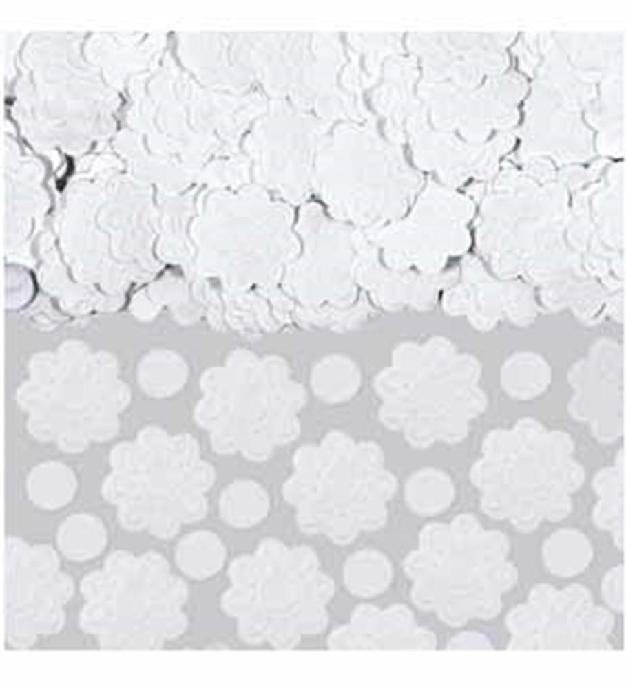 White paper confetti in floral and circular shapes scattered on gray background.