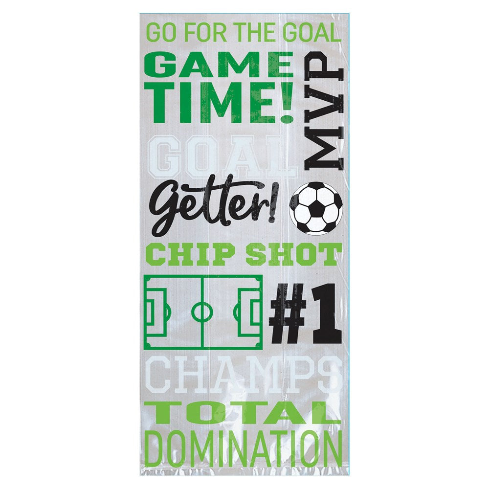 White party bag with green and black soccer-themed text and graphics including a soccer ball, goalposts, and phrases like.