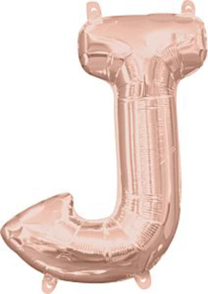 16-inch rose gold foil balloon in the shape of the letter J with hanging tabs.