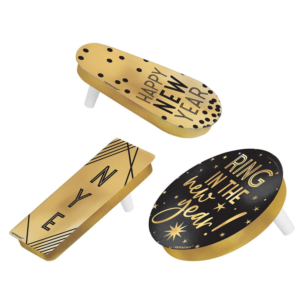 Gold and black plastic New Year's noisemakers with festive "Happy New Year" and "Ring in the New Year" text designs.