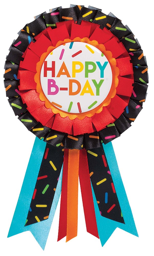 Round birthday ribbon button with colorful sprinkles, red and blue layers, and "Happy B-Day" text in multicolor letters.