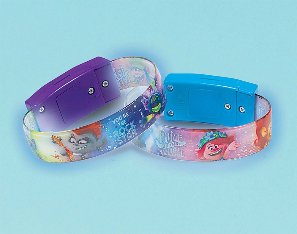Set of four translucent Trolls World Tour light-up bracelets with colorful character designs and snap closures.