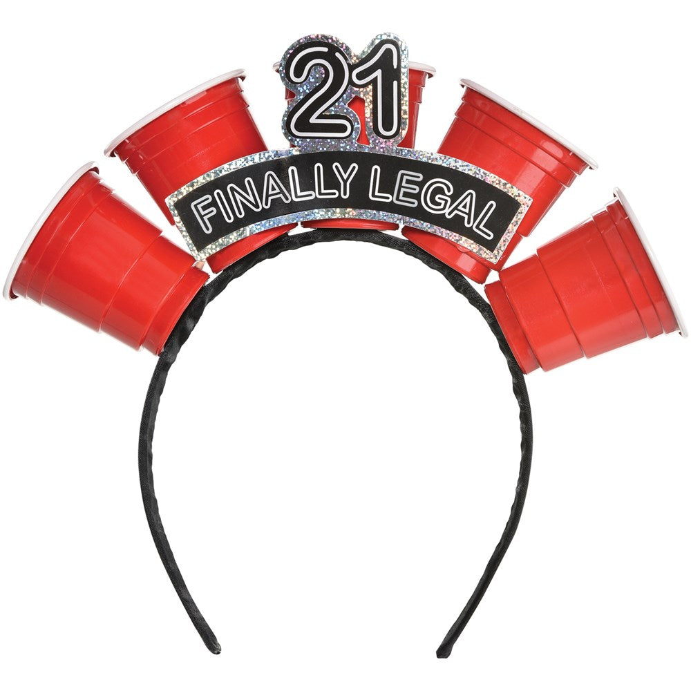 Black plastic headband with three red plastic shot glasses and a "21 Finally Legal" sign in black, white, and silver glitter.