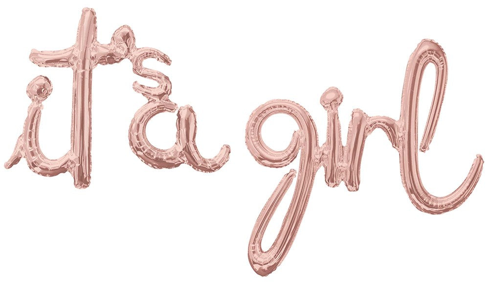 Rose gold foil balloon spelling "it's a girl" in cursive script letters.