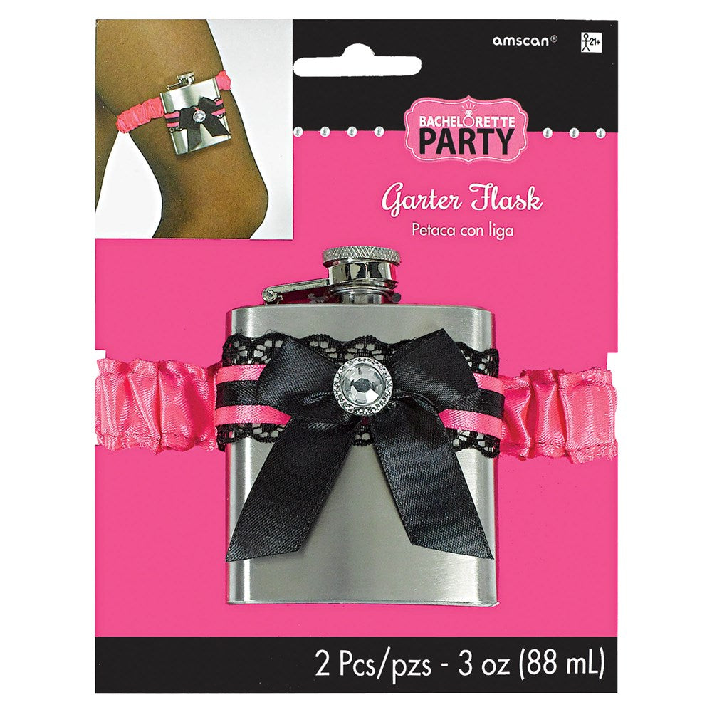 Stainless steel flask wrapped in pink ruffled fabric with black ribbon bow and rhinestone detail, fits on leg garter.