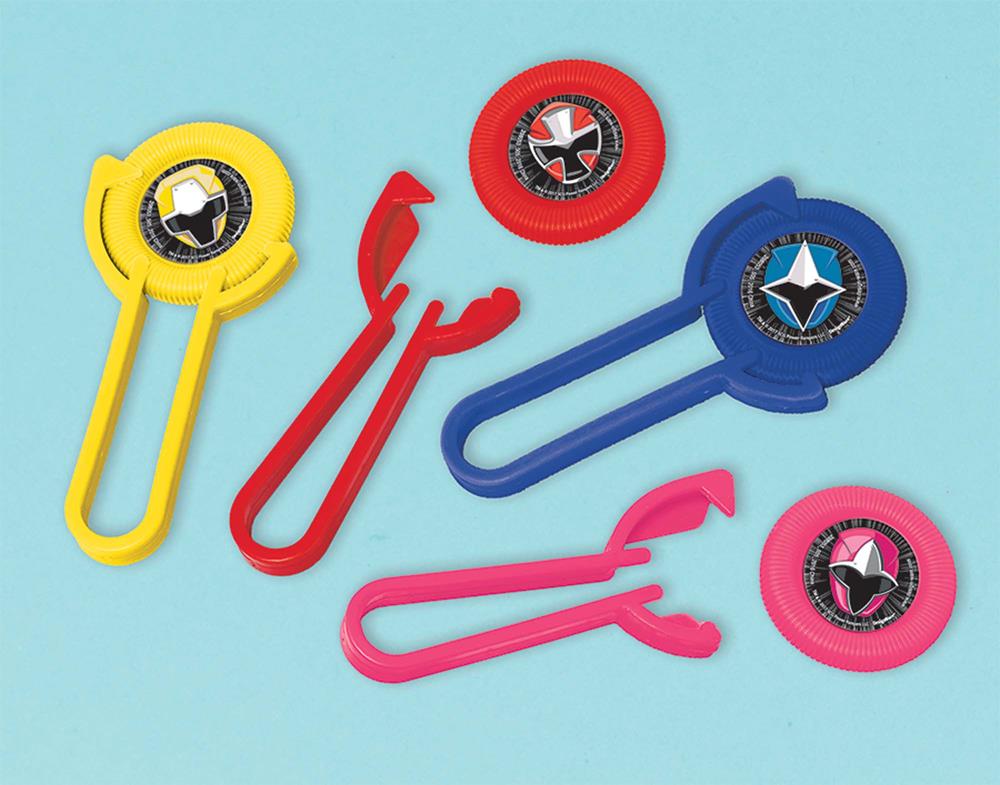 Colorful plastic ninja disc shooters with matching discs in yellow, red, blue, and pink, each featuring a Power Ranger.