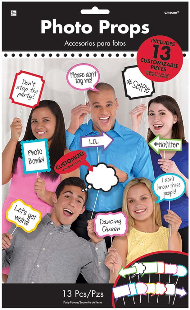 Set of 13 colorful photo booth signs with playful phrases, wooden sticks, and speech bubble shapes for parties.