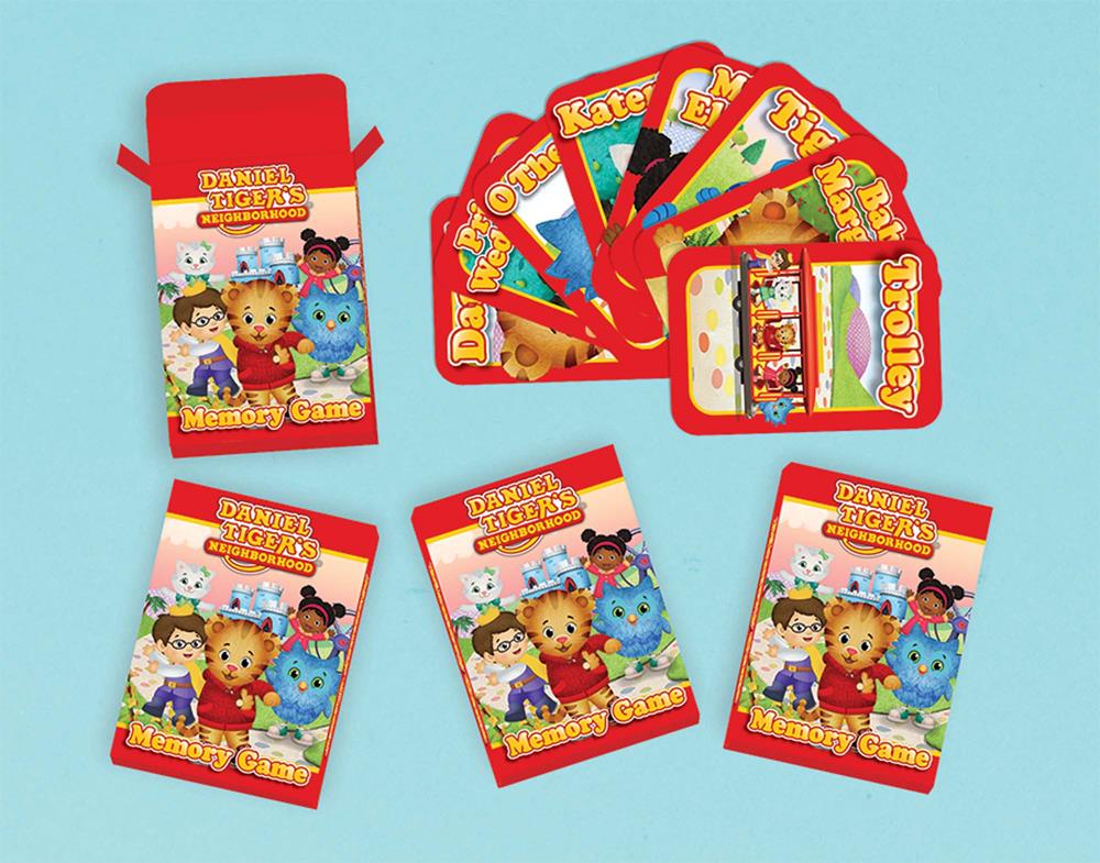 Daniel Tiger Neighborhood Memory Game with colorful character-themed cards and matching red box packaging.