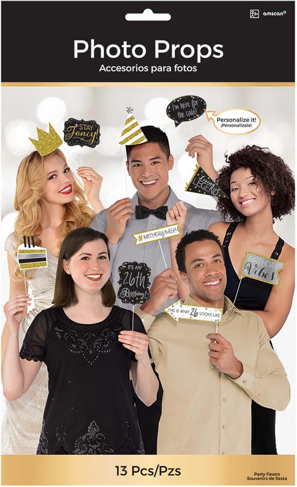 Set of 13 gold and black birthday photo props with phrases and party icons held by five adults.
