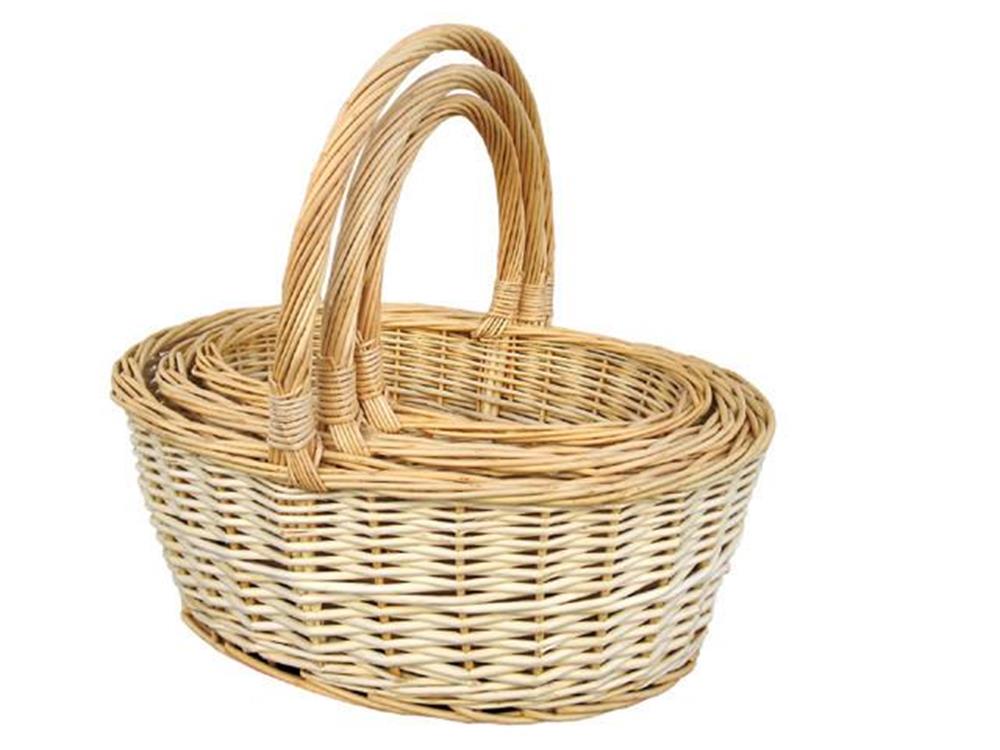 Oval woven wicker basket with two sturdy rounded handles and natural beige color.
