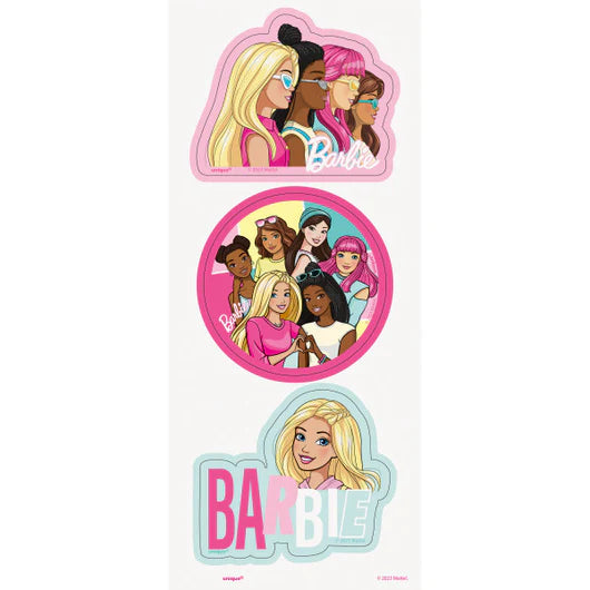 A group of diverse Barbie dolls outlined in pink, a round sticker with various Barbie characters on a pink background, and a
