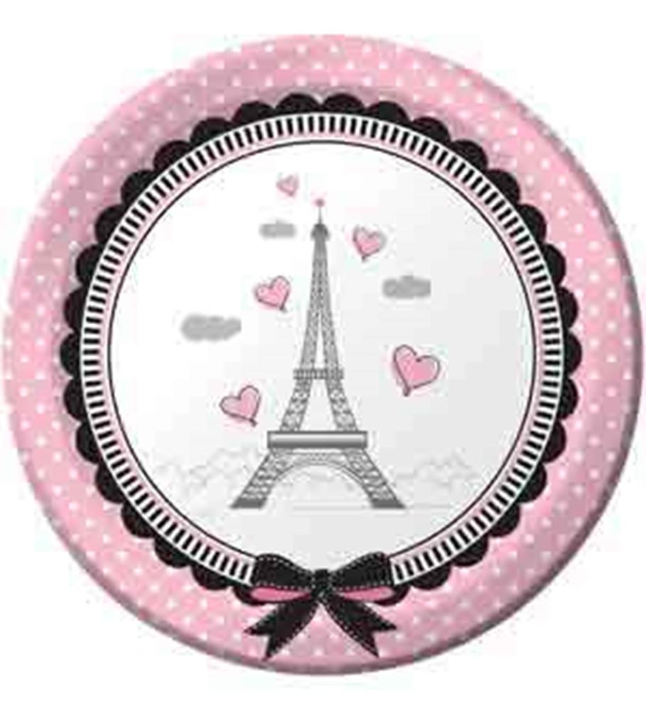 Round pink paper plate with white polka dots, Eiffel Tower design, and black bow at bottom.