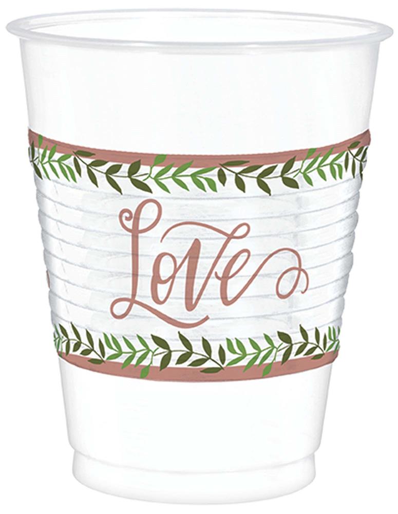 White plastic cup with green leaf borders and "Love" in cursive rose gold lettering.