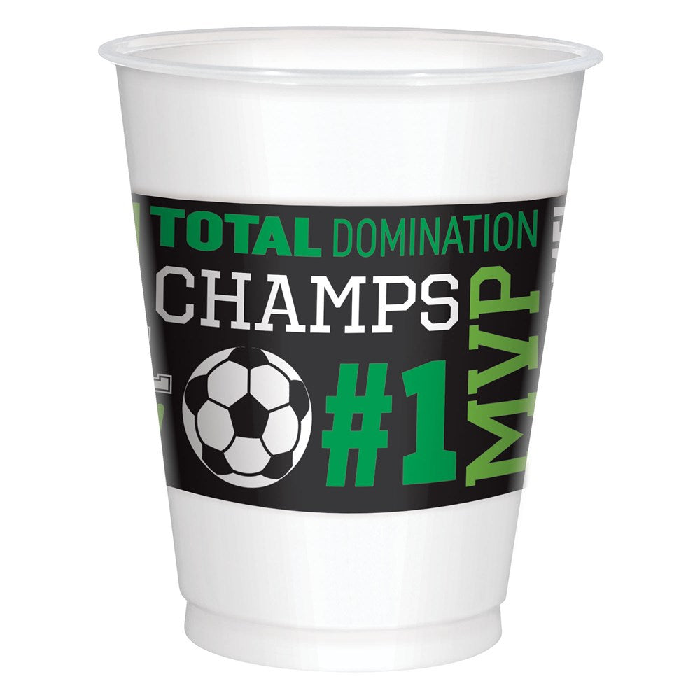 White plastic cup with black band featuring green and white text "Total Domination Champs #1 MVP" and a soccer ball graphic.