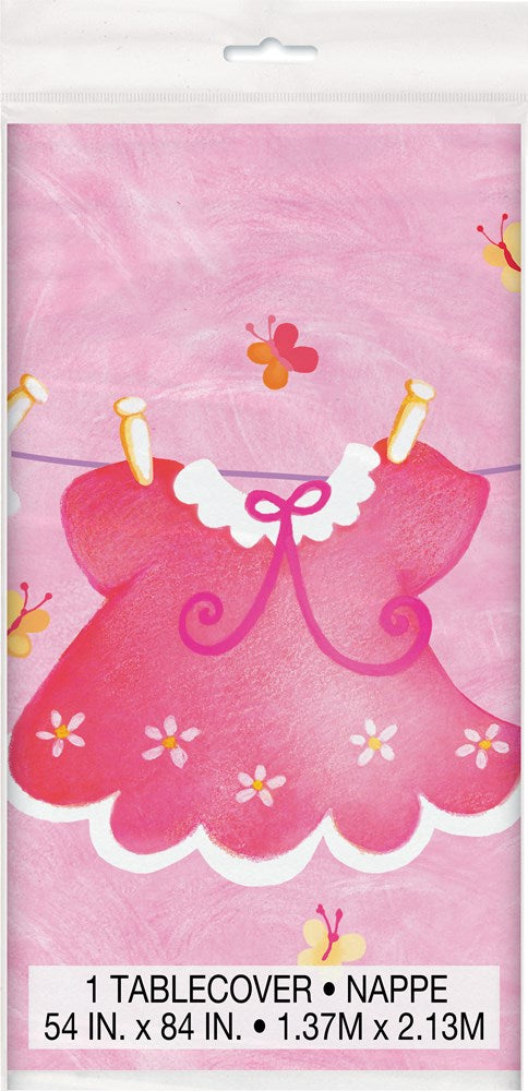 Pink tablecover with baby dress, clothesline, and flower illustrations, 54x84 inches.